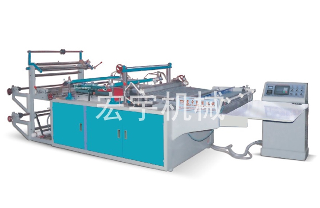 Large computer heat sealing and cutting bag making machine